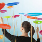 woman juggling plates